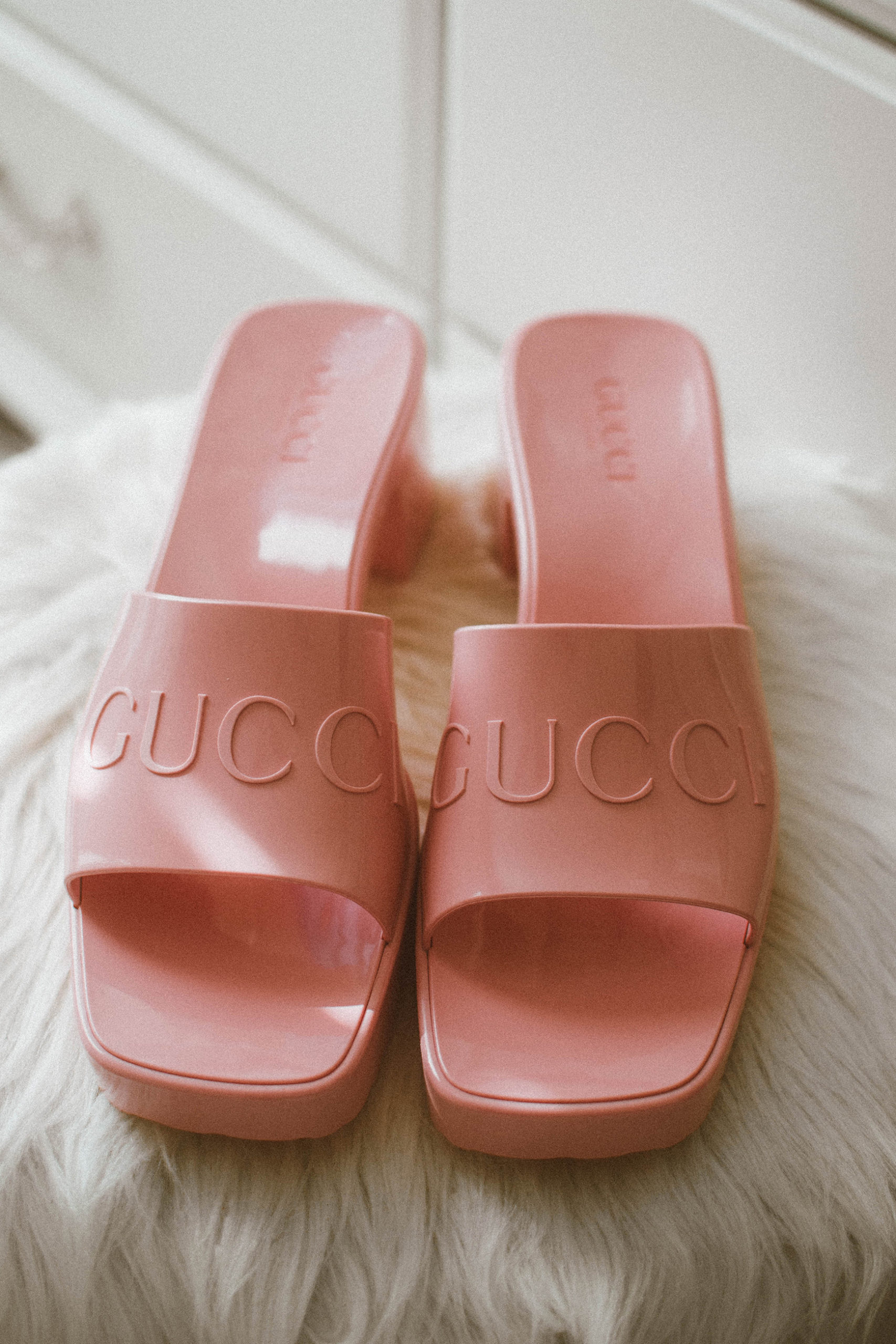 pink rubber gucci slides
